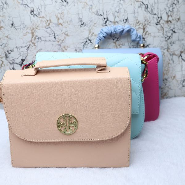 Bolso Manos Libres Nude Con Detalle Metálico Circular