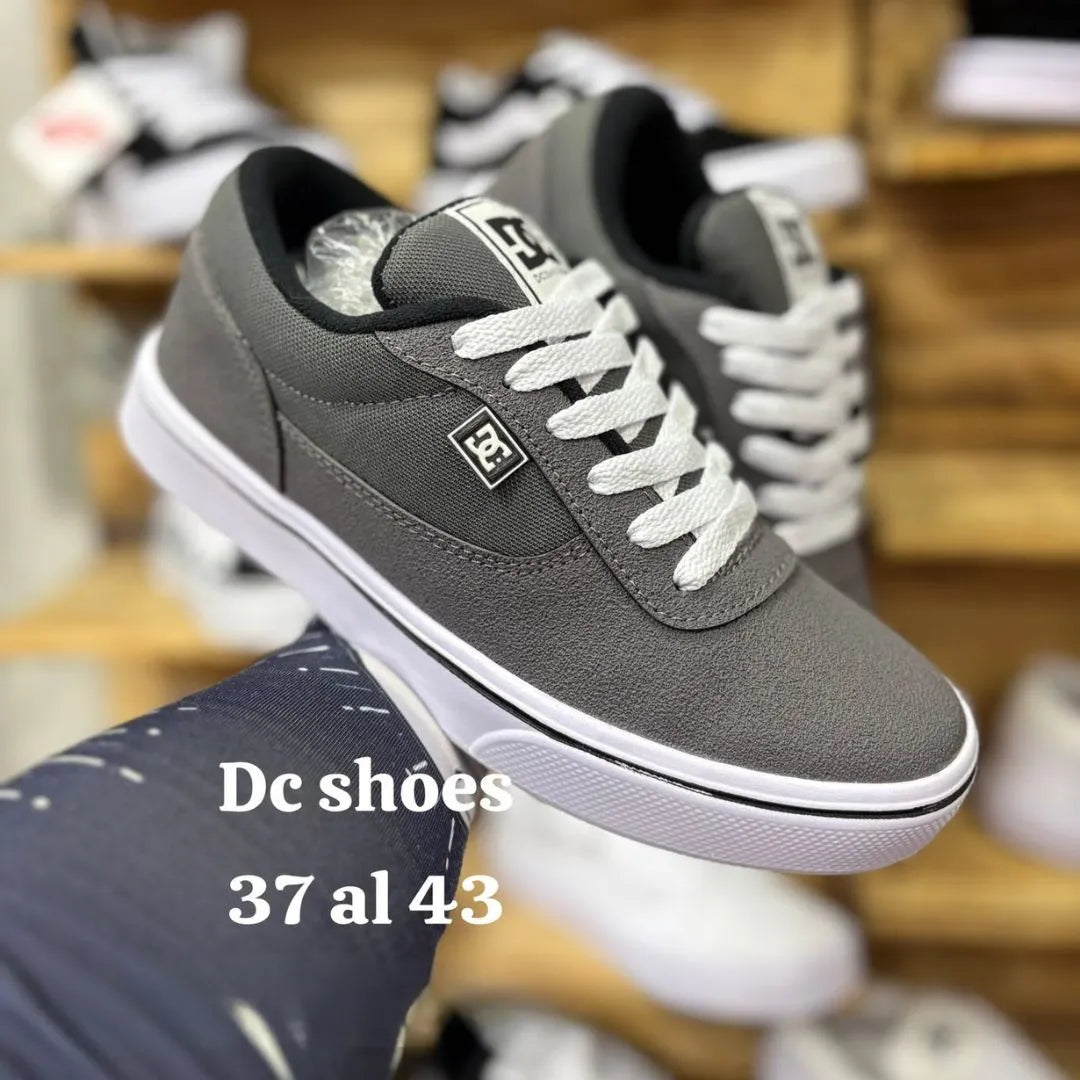 Zapatilla Dc Shoes Plano Gris y Blanco