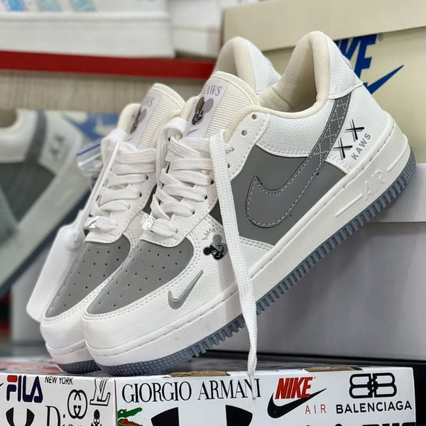 Zapatilla Nike Gris y Blanco
