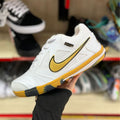 Zapatilla Unisex Futsal Nike Gato Blanco y Dorado