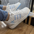 Zapatilla Adidas Forum Blanco y Azul