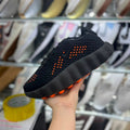Zapatilla Nike Negro y Naranja Suela Gruesa