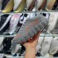Zapatilla Nike Gris y Naranja Suela Gruesa (Copia)