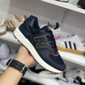 Zapatilla New Balance Azul y Cafe Casual Sport