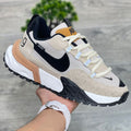 Zapatilla Nike Gaxing Beige