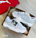Zapatilla Puma Unisex Gris y Blanco